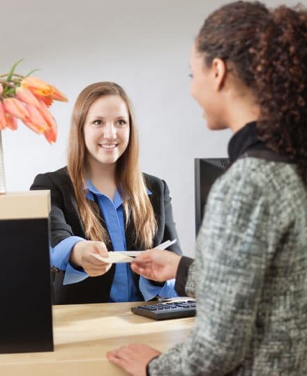 teller at a bank and customer