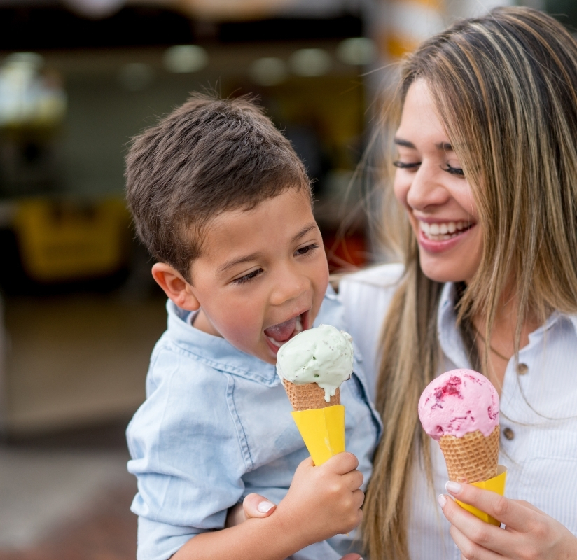 Mom and son enjoying ice cream cones