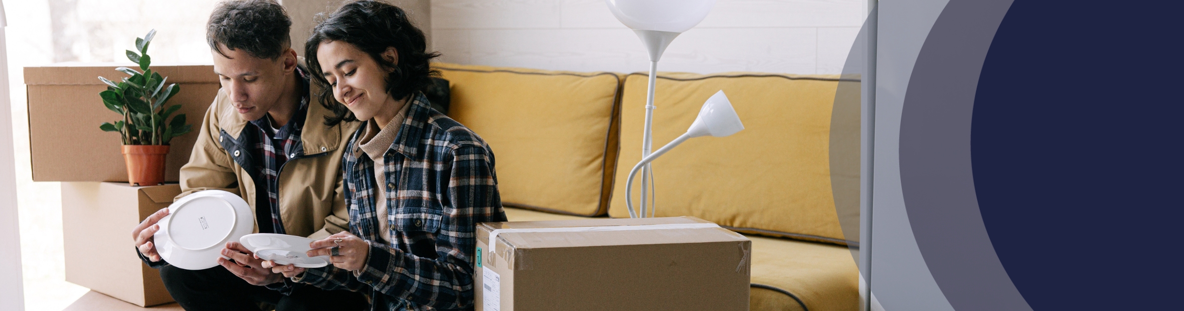 Couple unpacking dishes