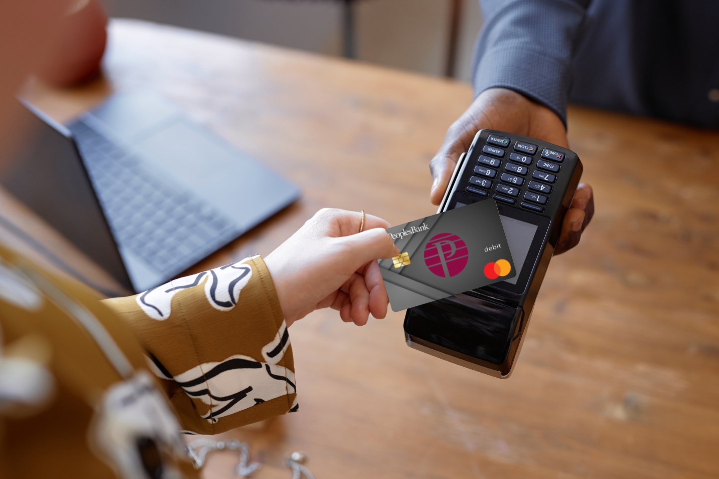 paying with a contactless Peoples Bank debit card