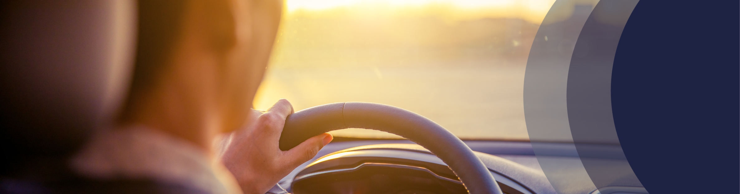 hands on a steering wheel