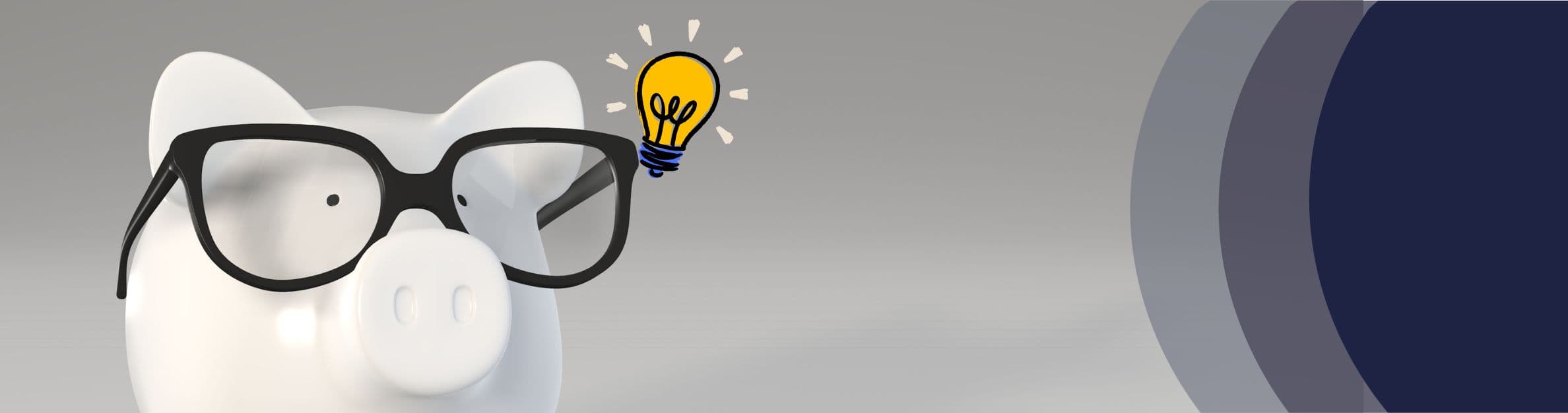 piggy bank wearing black glasses and a light bulb by it