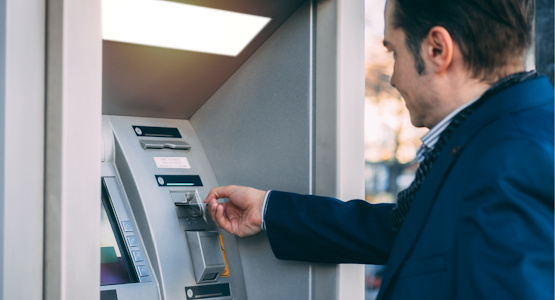 Man using an ATM