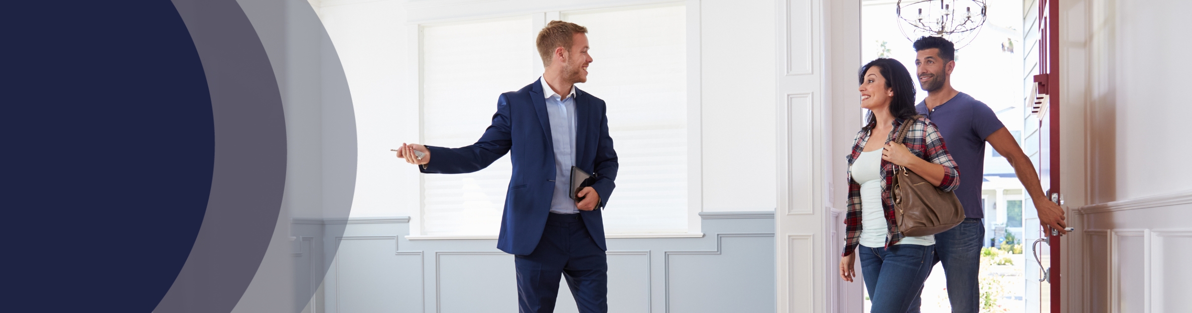 realtor showing couple a house